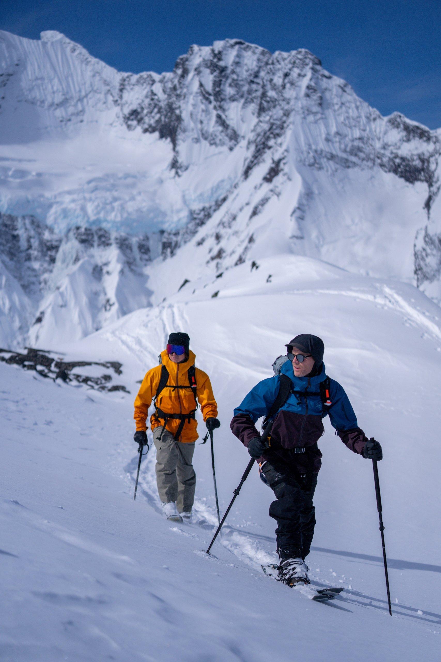 two people ski touring on a mountain